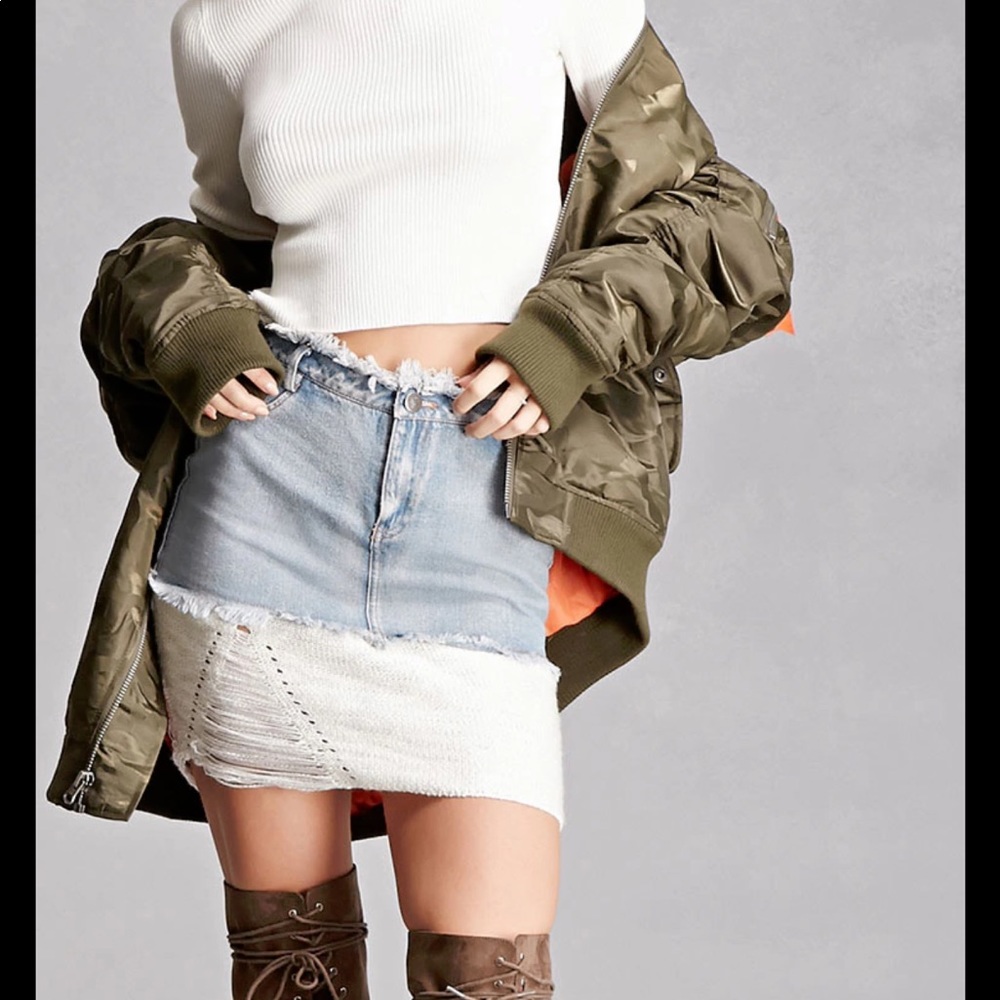 Distressed denim sweater hem mini skirt